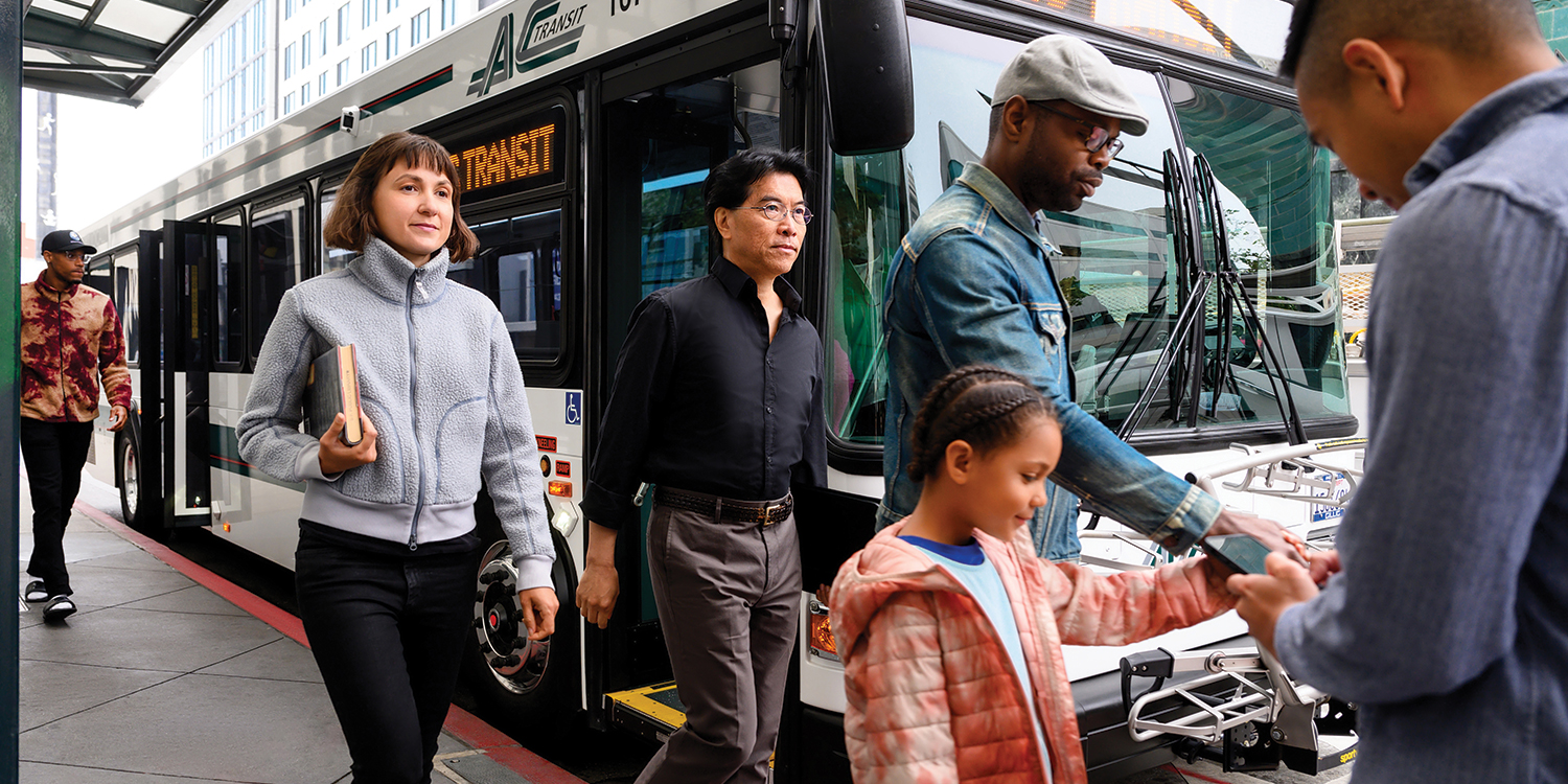 Riders getting off AC Transit bus