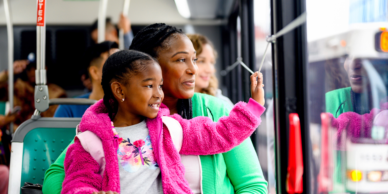 Mother and daughter on board AC Transit bus