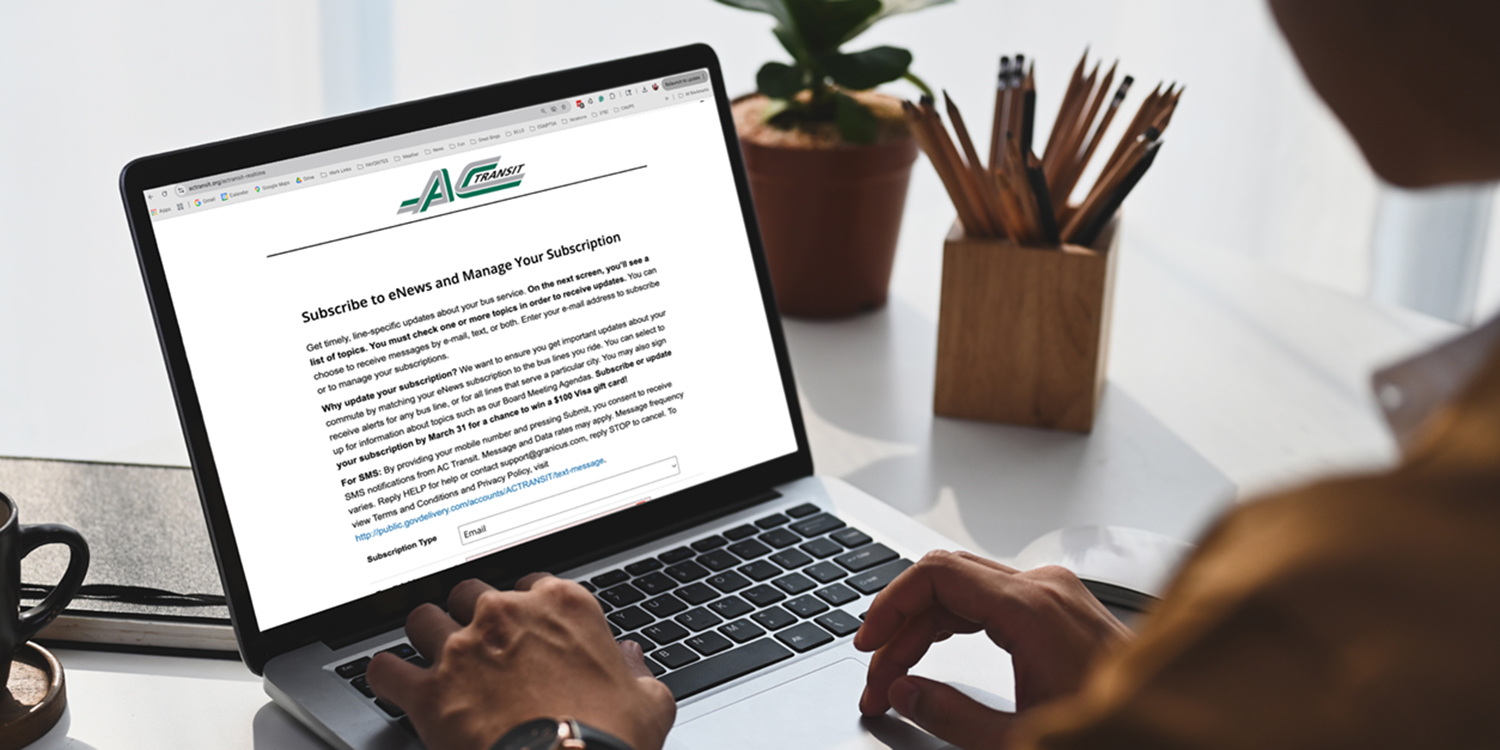 Man on laptop subscribing to AC Transit's eNews