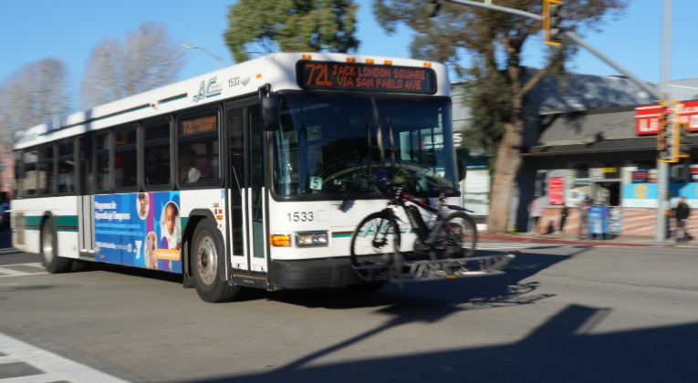 Group of young people talking with each other on the bus
