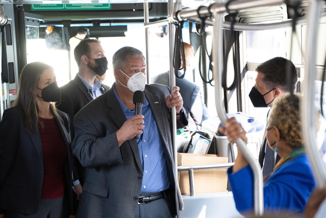 AC Transit General Manager Michael Hursh speaks to U.S. Secretary of Transportation Pete Buttegieg onboard AC Transit bus. 