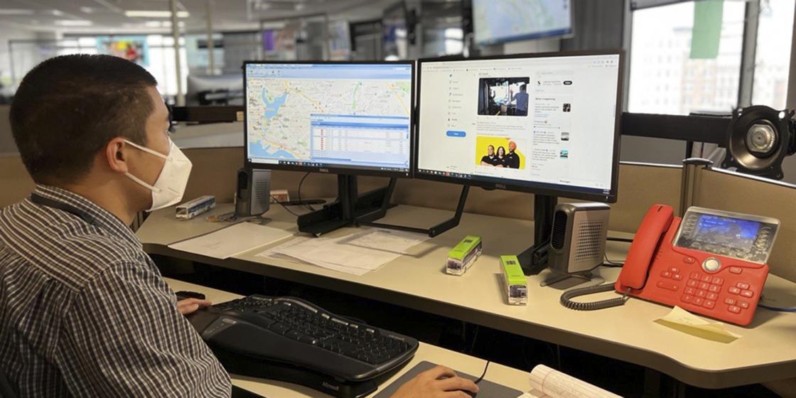 Staff member looking at computer screen