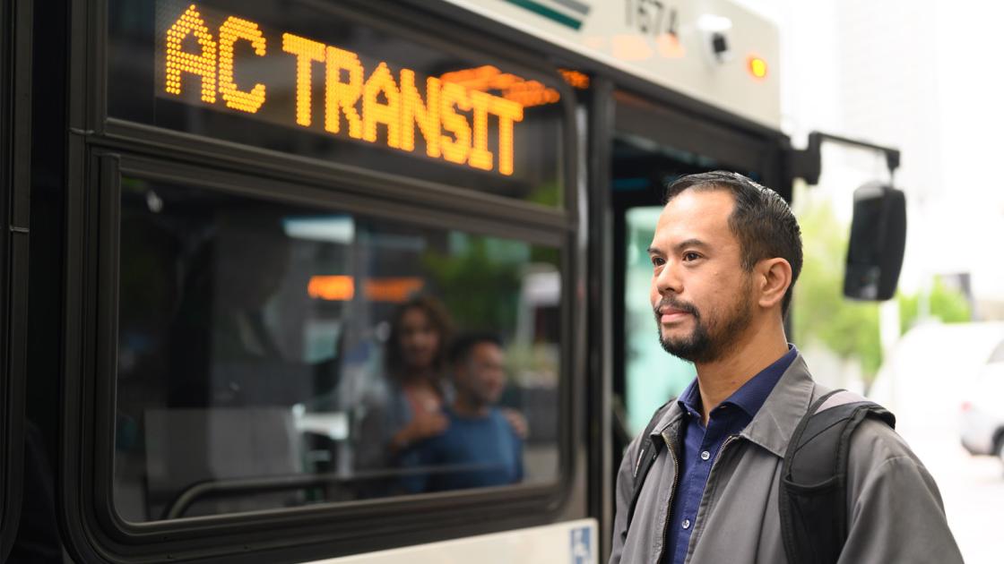Man off boarding AC Transit Bus