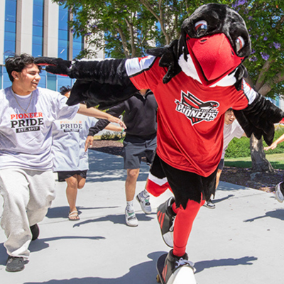 Mascot Perry runs across Cal State East Bay campus