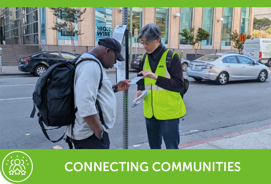 Transit Ambassador speaking to rider at bus stop
