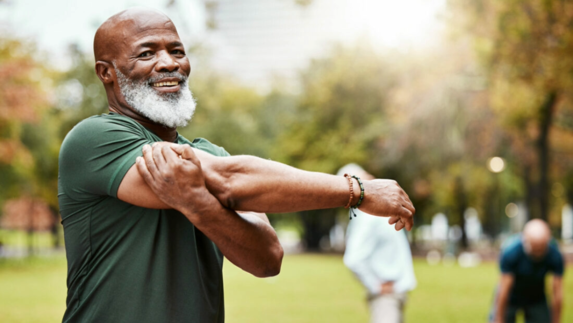 Man stretching at park