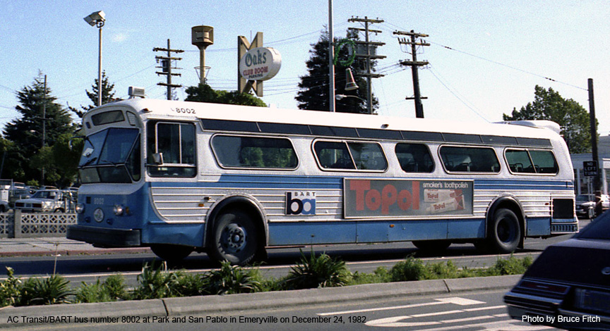AC Transit/BART bus 8002 in BART colors in December 1982.